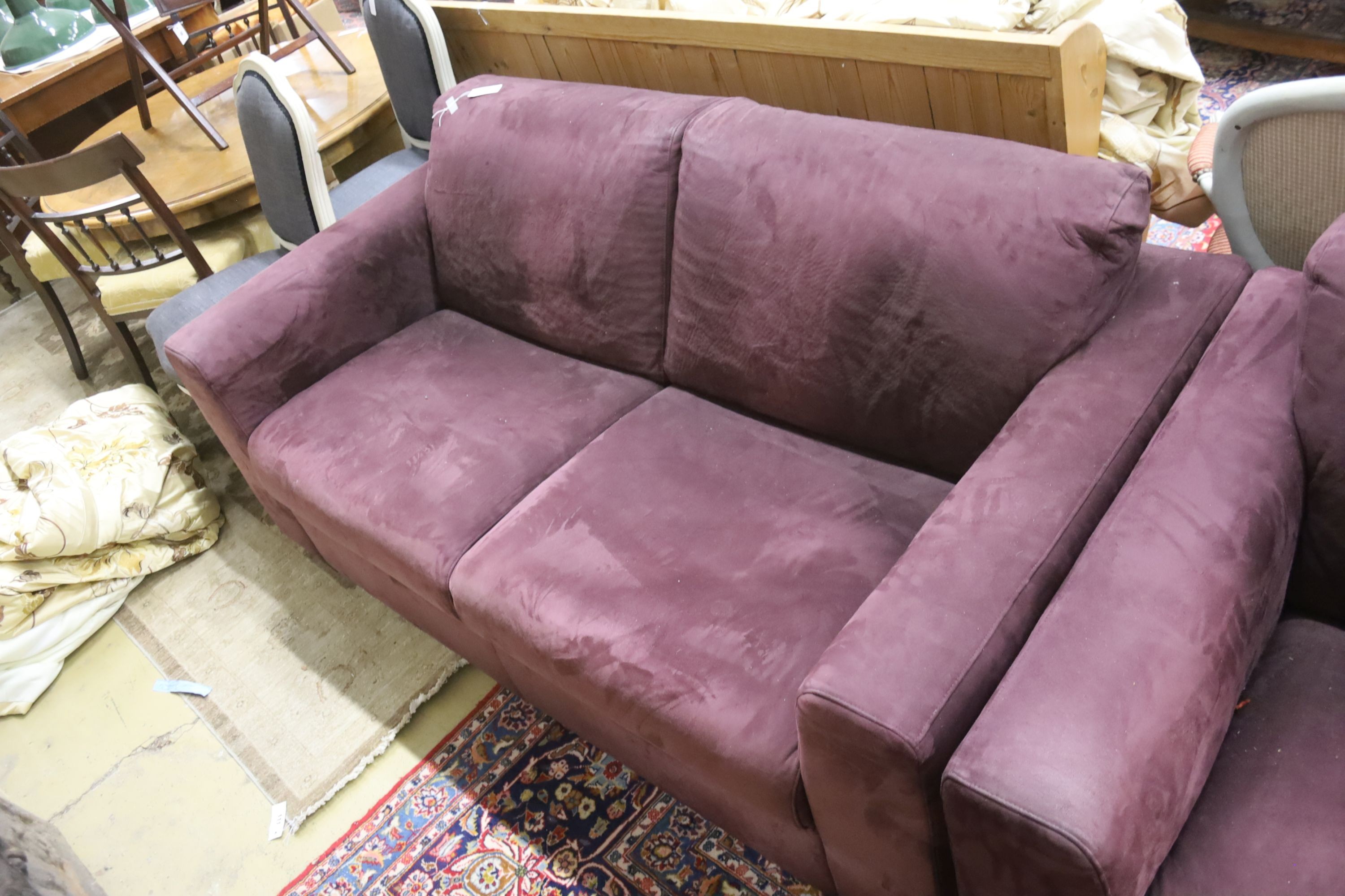 A pair of contemporary mauve fabric two seater settees, length 174cm, depth 94cm, height 80cm